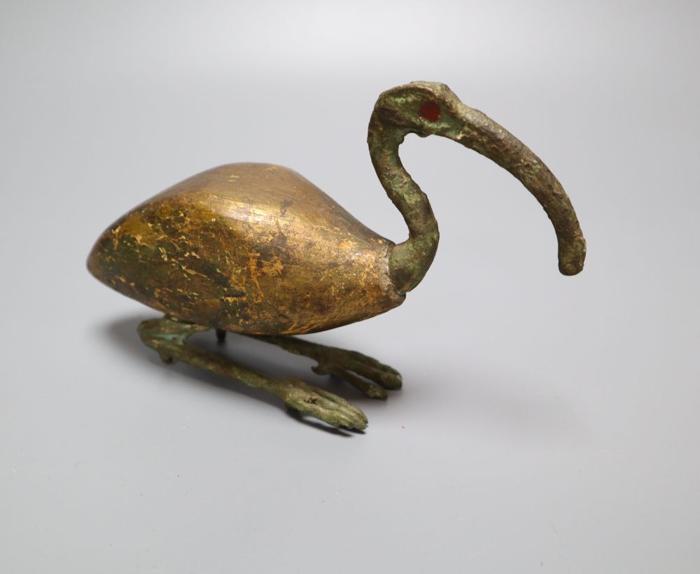 A bronze and wood model of an Ibis, L 18cm